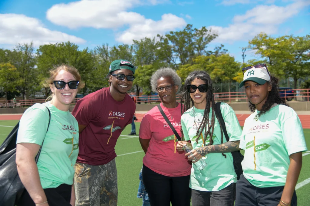 CASES staff on sports field.